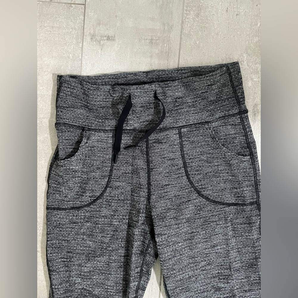 Lululemon luon variegated knit black boot cut leggings, size 10